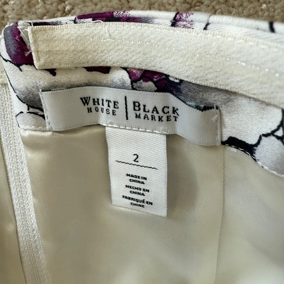 White floral sleeveless top.  Size 2 - Picture 2 of 2